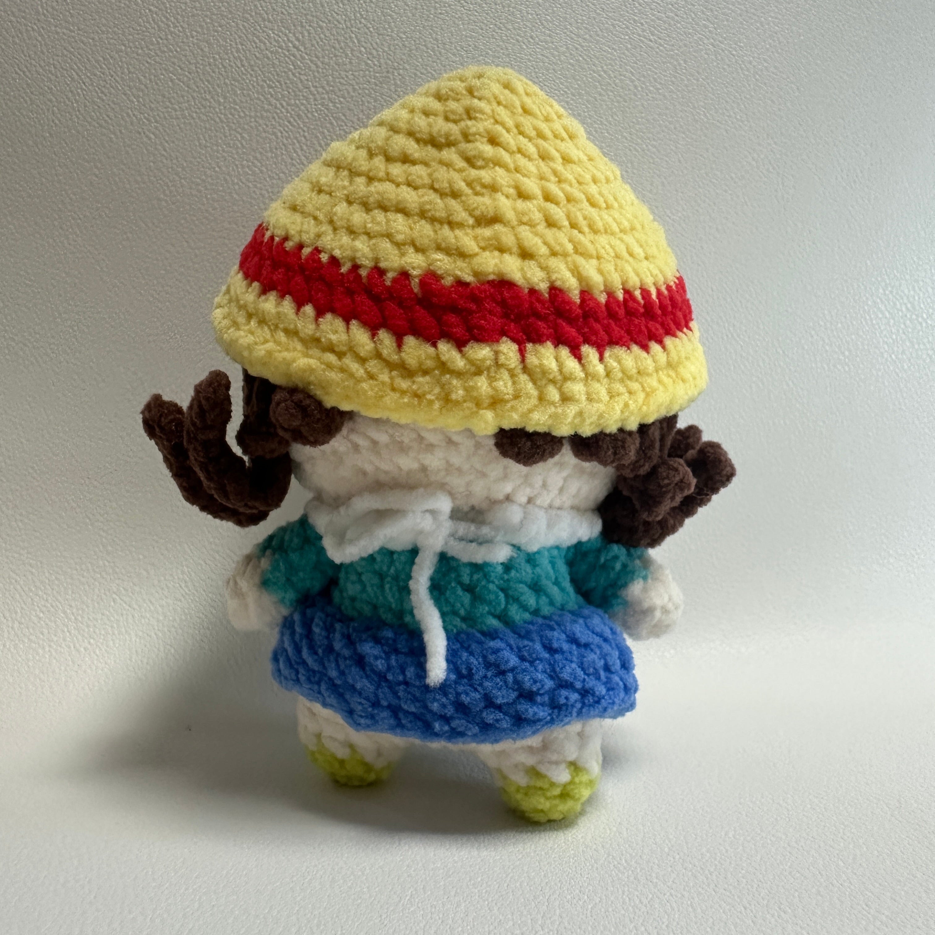 Handmade Crochet Girl Keychain – Glasses, Yellow Hat & Rainbow Sweater | 10cm Amigurumi Charm
