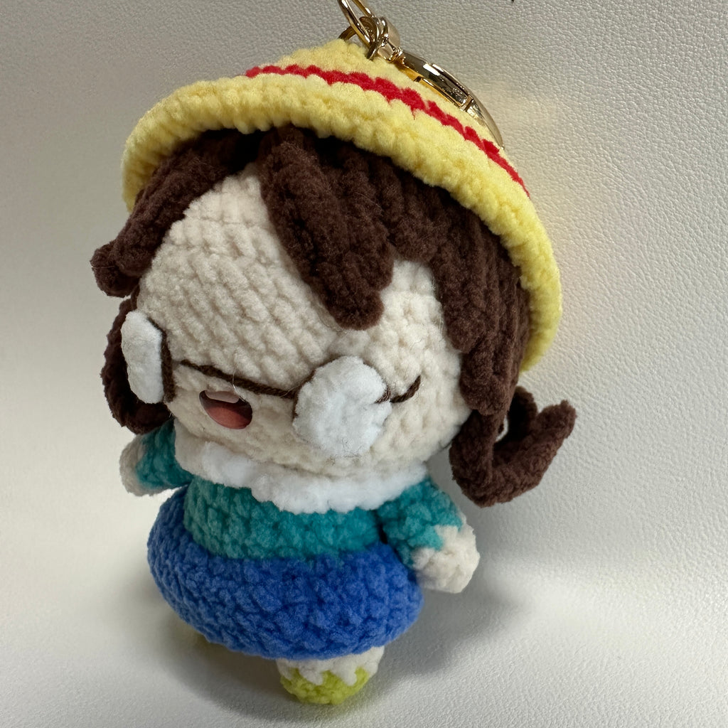 Handmade Crochet Girl Keychain – Glasses, Yellow Hat & Rainbow Sweater | 10cm Amigurumi Charm