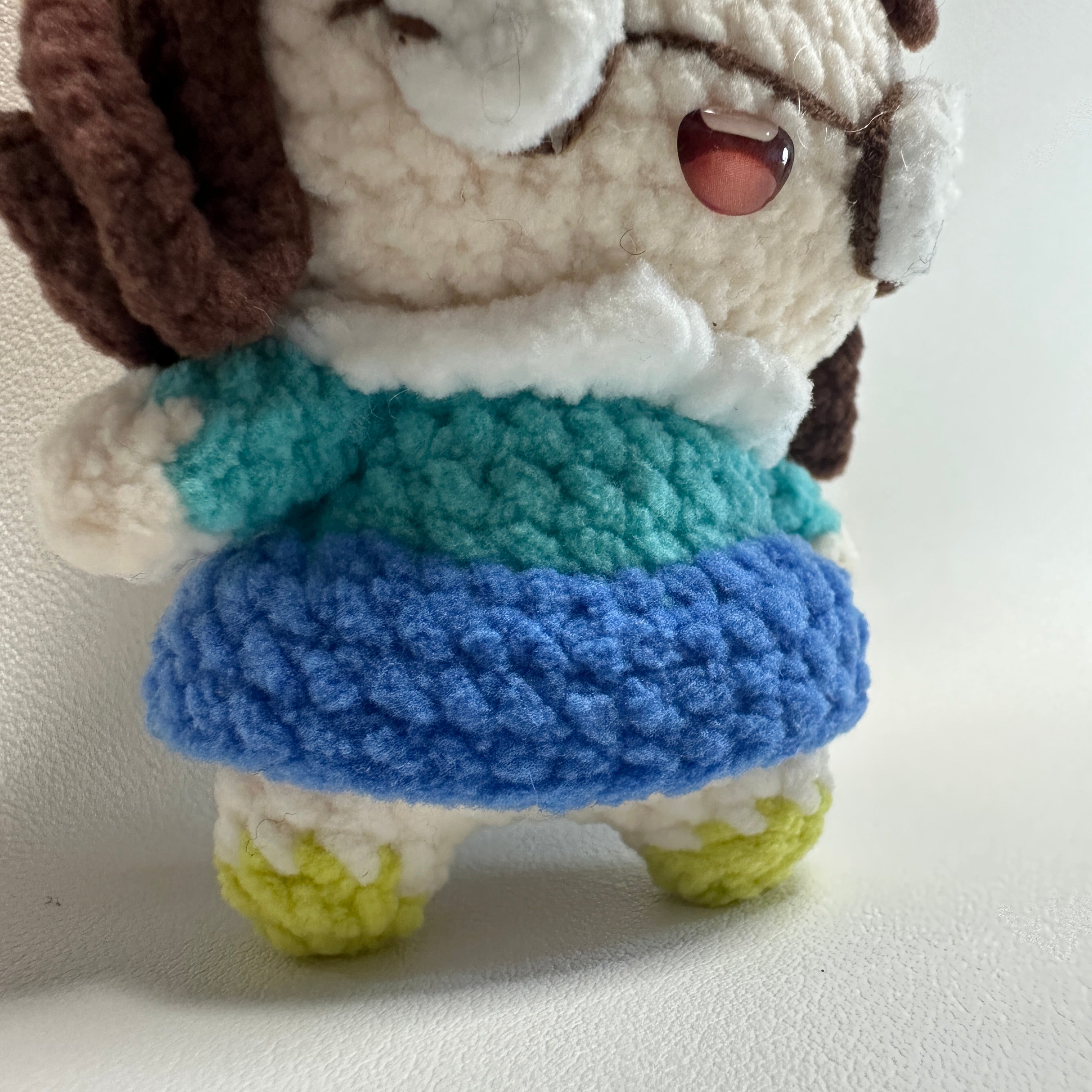 Handmade Crochet Girl Keychain – Glasses, Yellow Hat & Rainbow Sweater | 10cm Amigurumi Charm