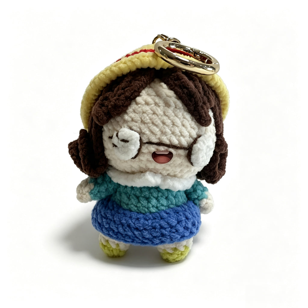 Handmade Crochet Girl Keychain – Glasses, Yellow Hat & Rainbow Sweater | 10cm Amigurumi Charm