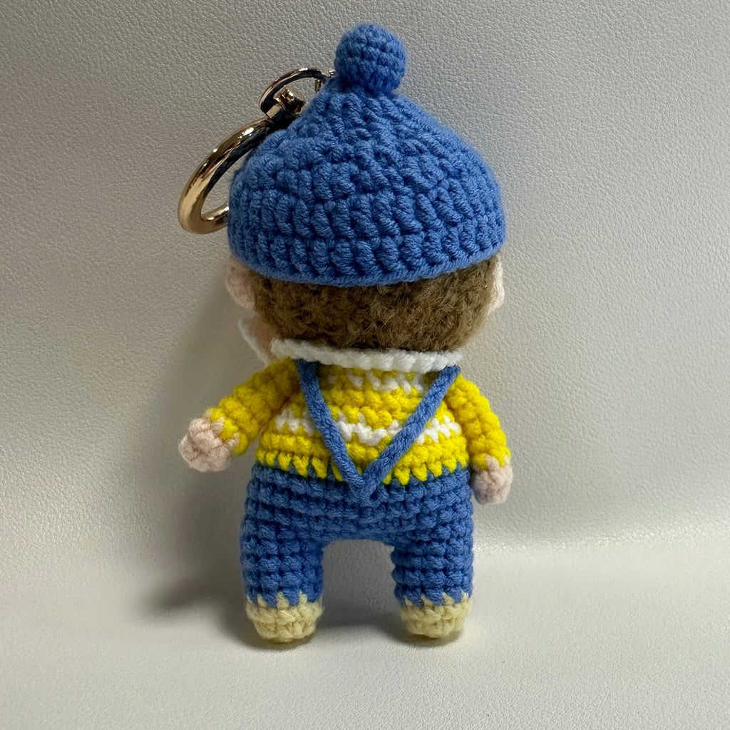 Handmade Crochet Boy Keychain – Blue Cap, Yellow Sweater & Denim Overalls | 10cm Amigurumi Charm