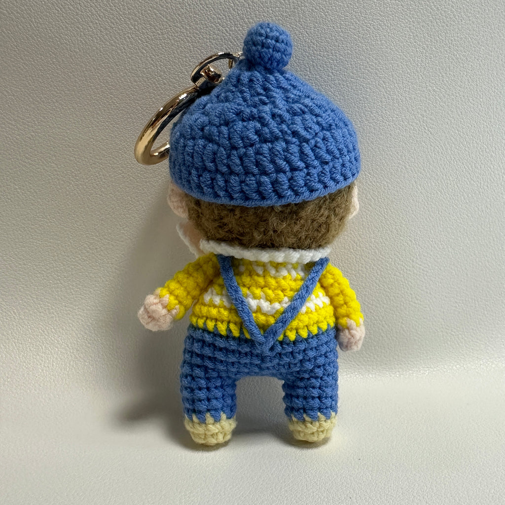 Handmade Crochet Boy Keychain – Blue Cap, Yellow Sweater & Denim Overalls | 10cm Amigurumi Charm