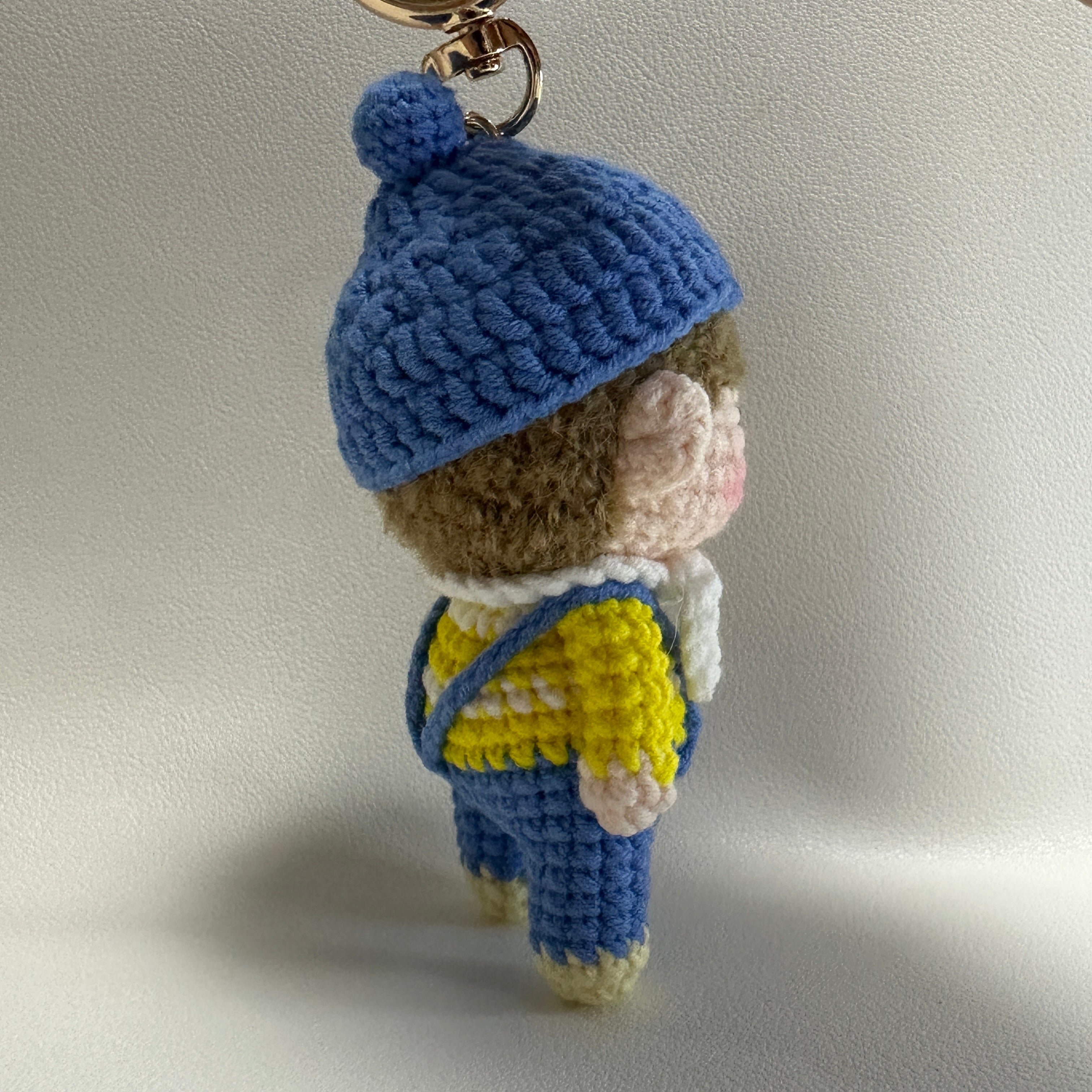 Handmade Crochet Boy Keychain – Blue Cap, Yellow Sweater & Denim Overalls | 10cm Amigurumi Charm