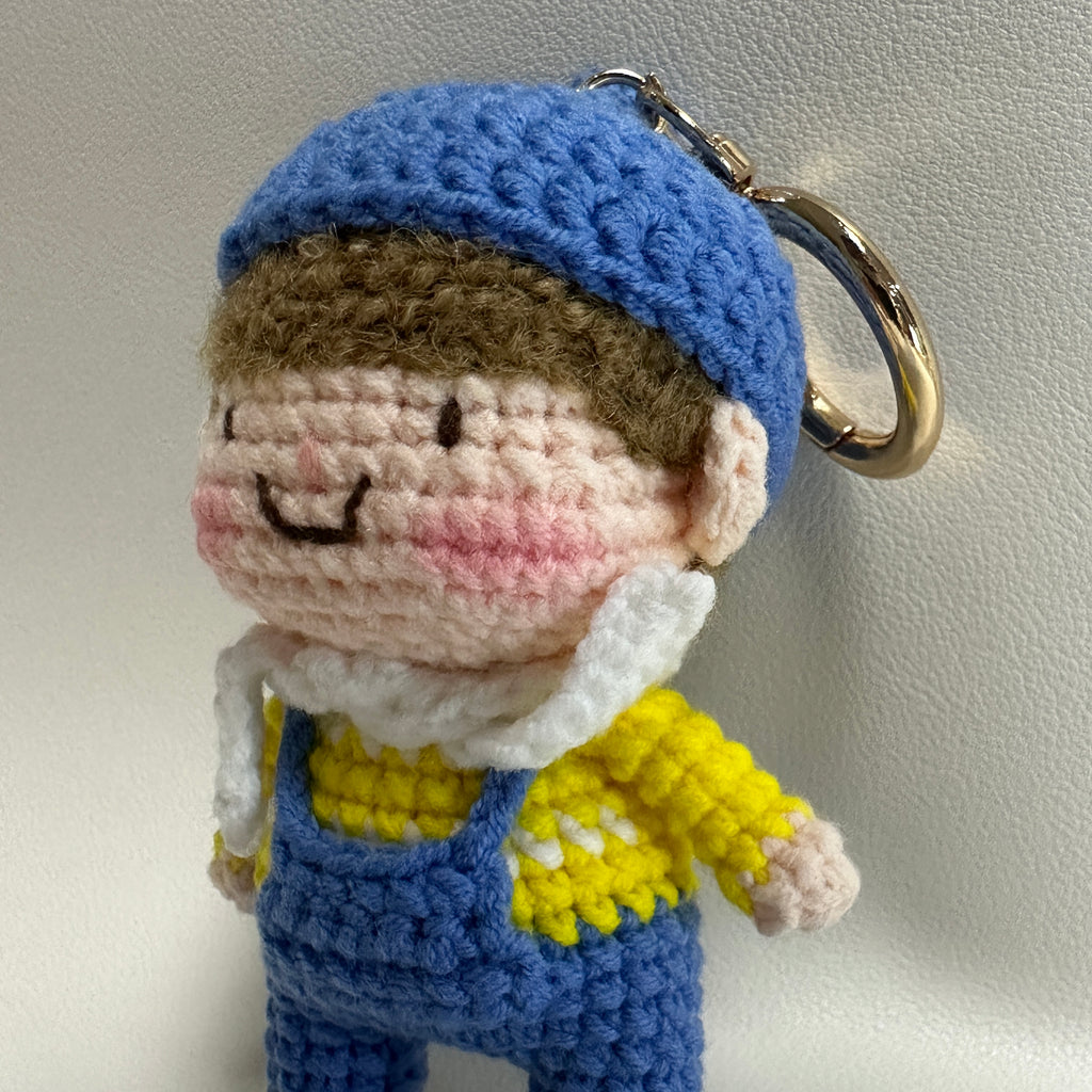 Handmade Crochet Boy Keychain – Blue Cap, Yellow Sweater & Denim Overalls | 10cm Amigurumi Charm