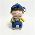 Handmade Crochet Boy Keychain – Blue Cap, Yellow Sweater & Denim Overalls | 10cm Amigurumi Charm