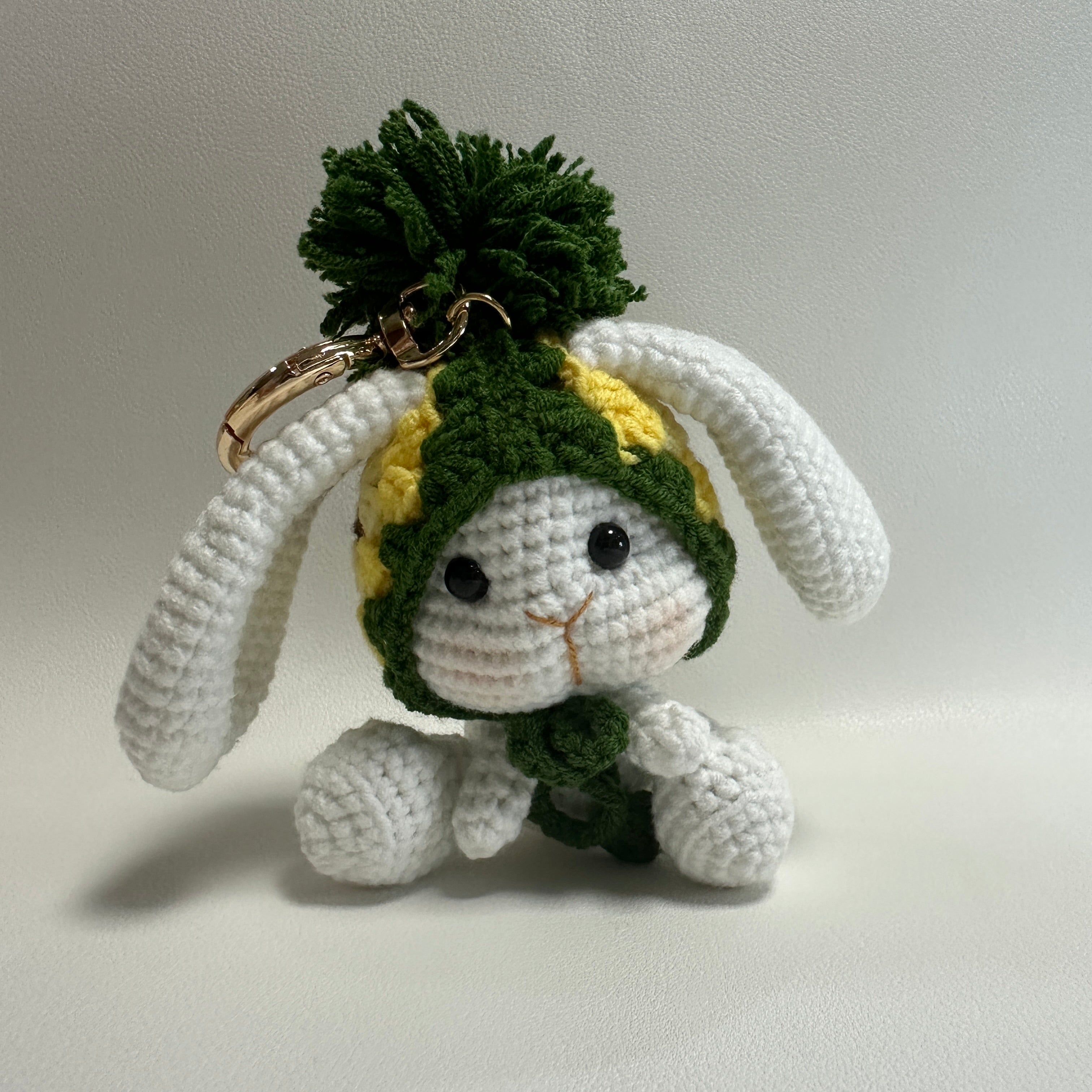 Handmade Crochet Bunny Keychain – Pineapple Hat & Long Ears | 10cm Amigurumi Charm