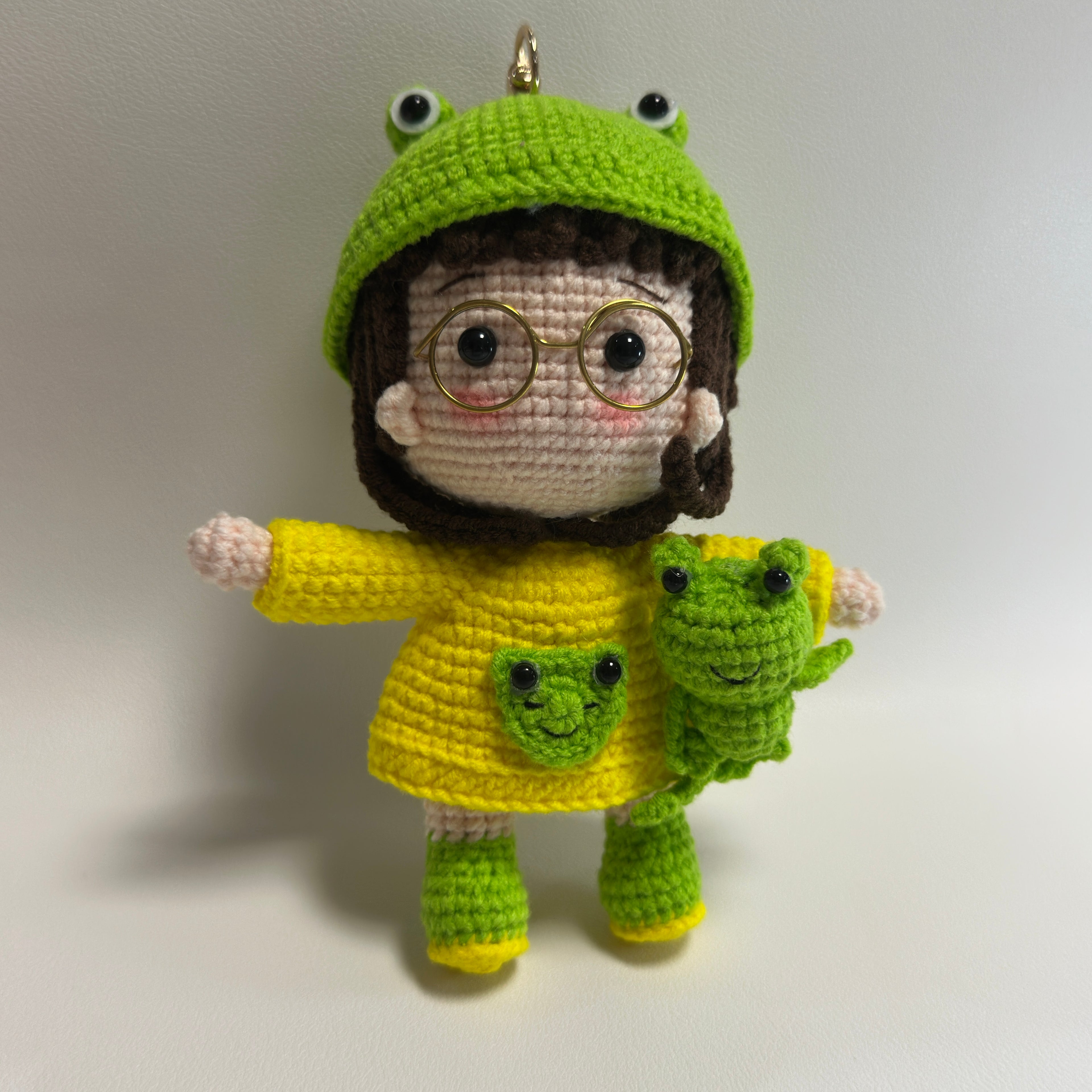 Handmade Crochet Frog Girl Keychain – Gold Glasses, Yellow Raincoat & Mini Frog Buddy | 13cm Amigurumi Charm