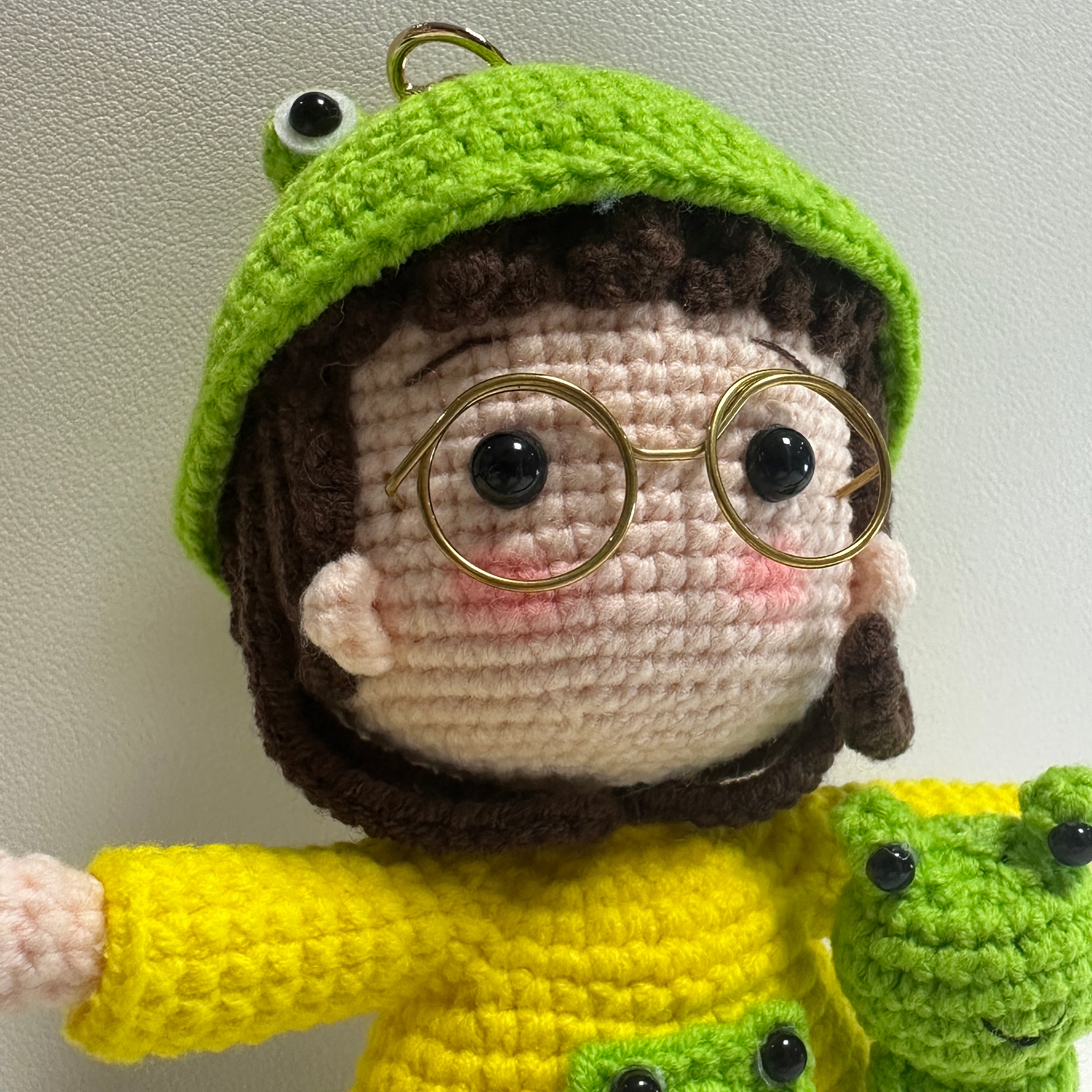 Handmade Crochet Frog Girl Keychain – Gold Glasses, Yellow Raincoat & Mini Frog Buddy | 13cm Amigurumi Charm