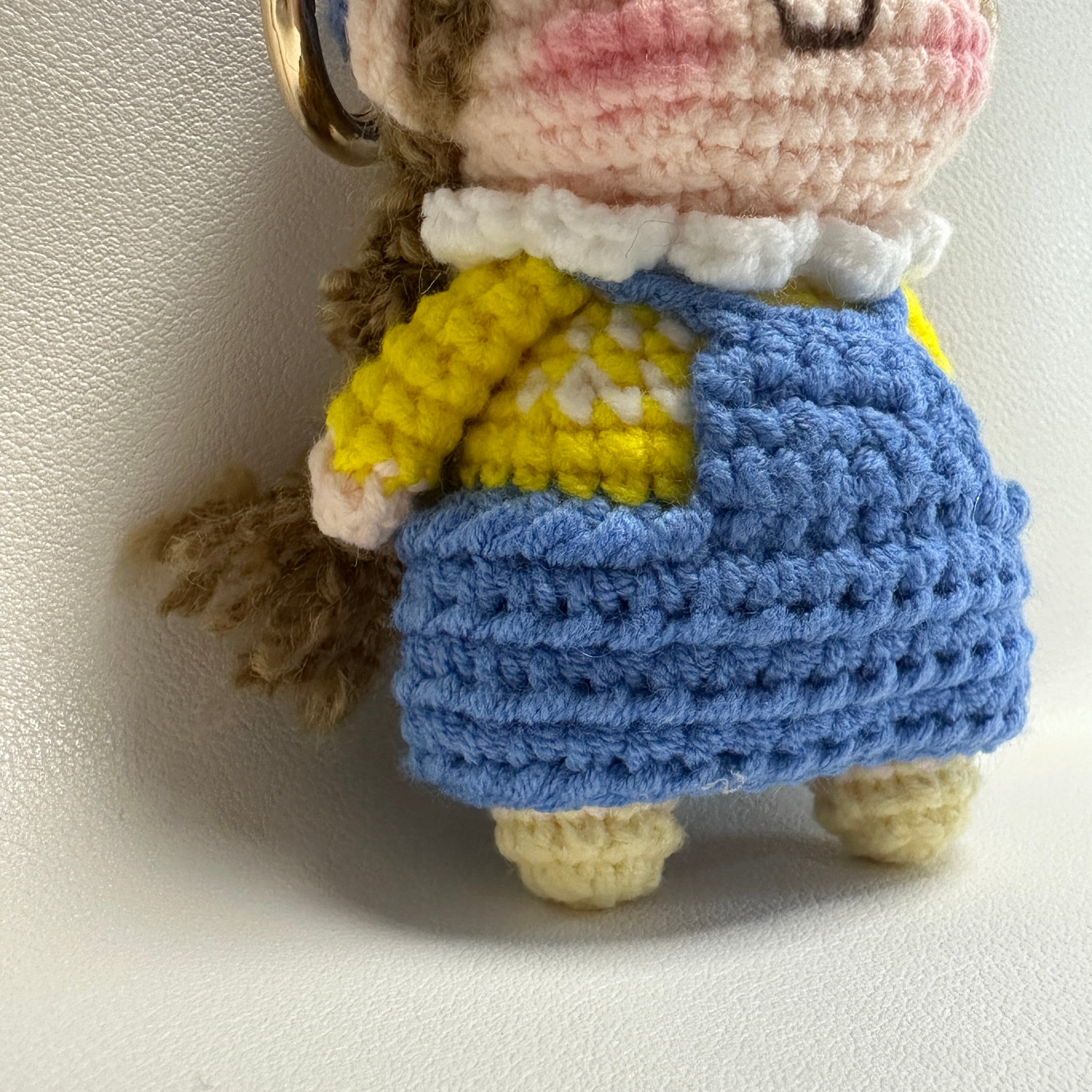 Handmade Crochet Girl Keychain – Blue Beret, Yellow Sweater & Pinafore Dress | 10cm Amigurumi Charm