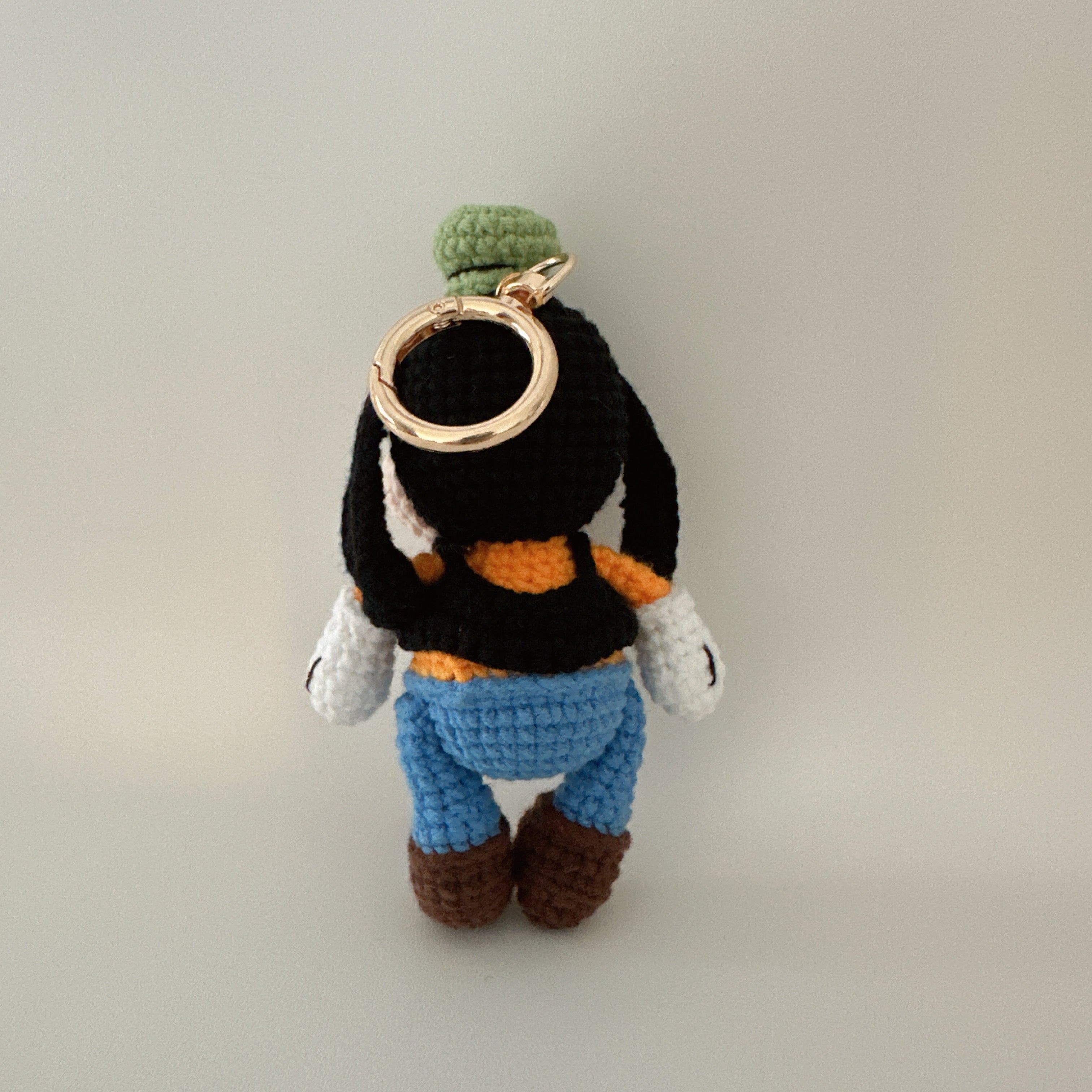Clumsy Pup Amigurumi Charm — Handmade Crochet Keychain Doll