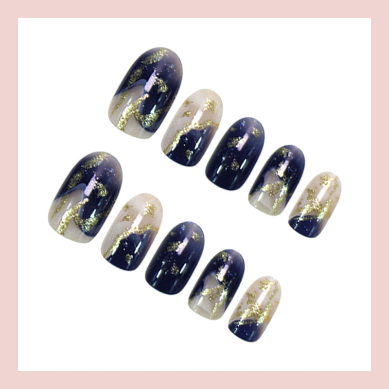 Detailed view of blooming flower pattern on ice blue nails